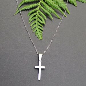 Dainty small ladies or children cross